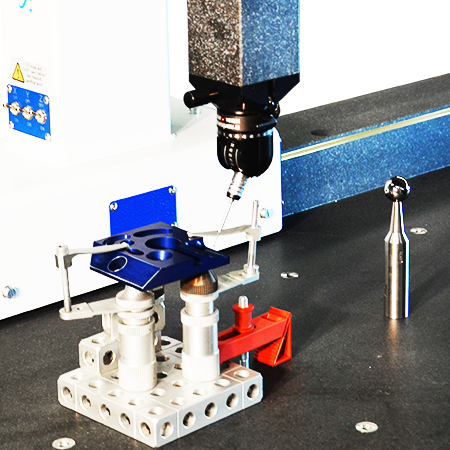 Hand-held measuring machine with clamping system